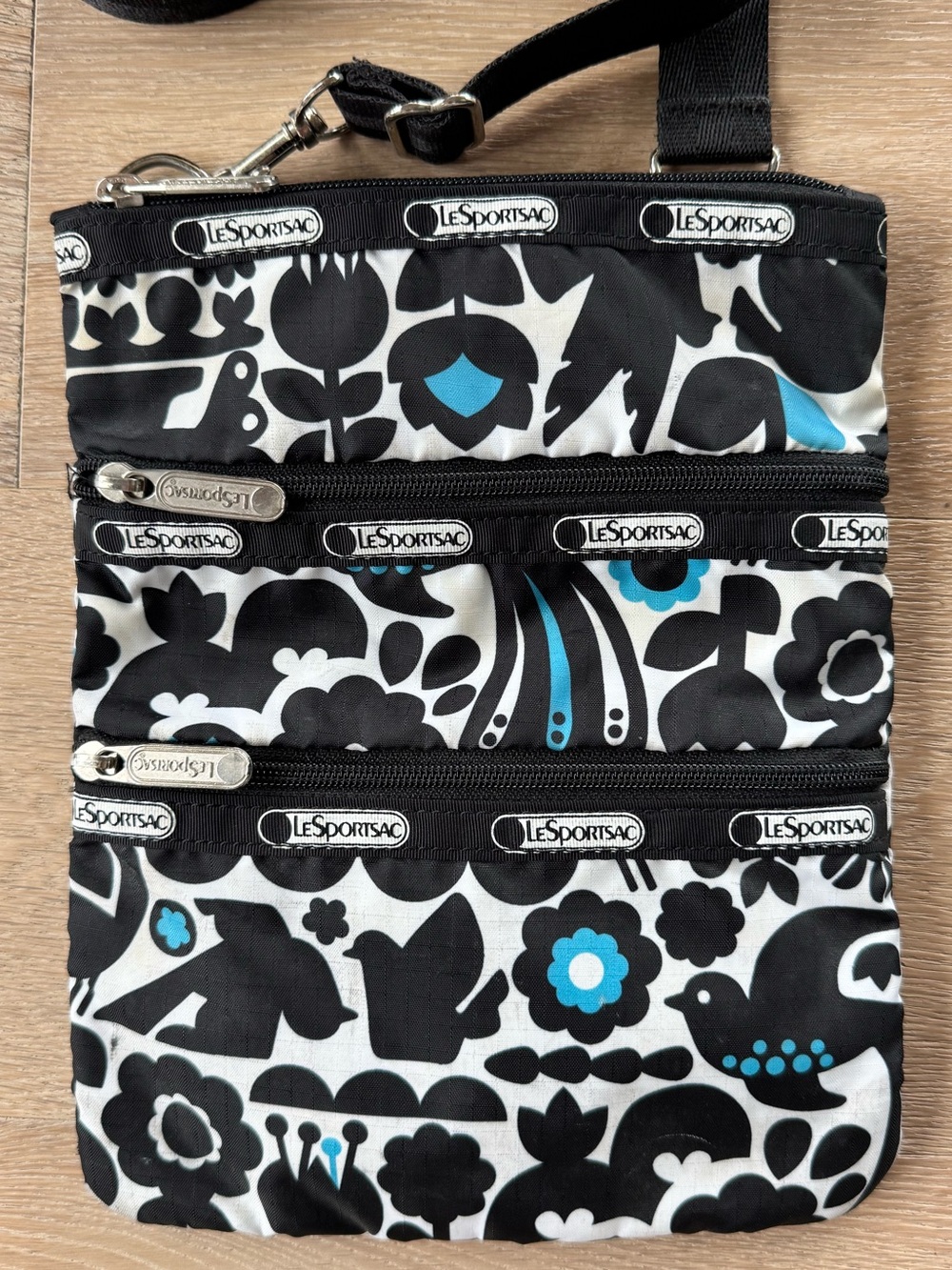 Lesportsac Black and Teal Floral Pattern Crossbody Belt Bag